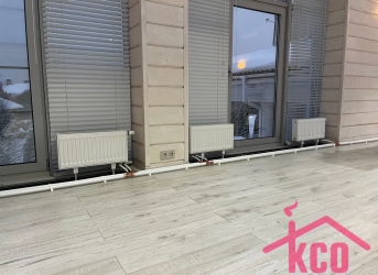 Монтаж системы отопления в зимнем саду частного дома в коттеджном поселке 